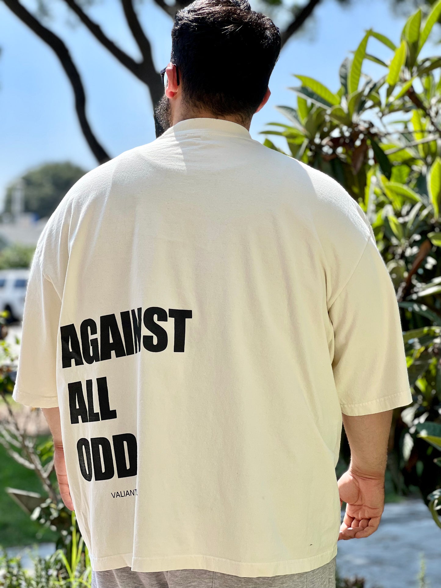 “AGAINST ALL ODDS” Drop Shoulder Tee