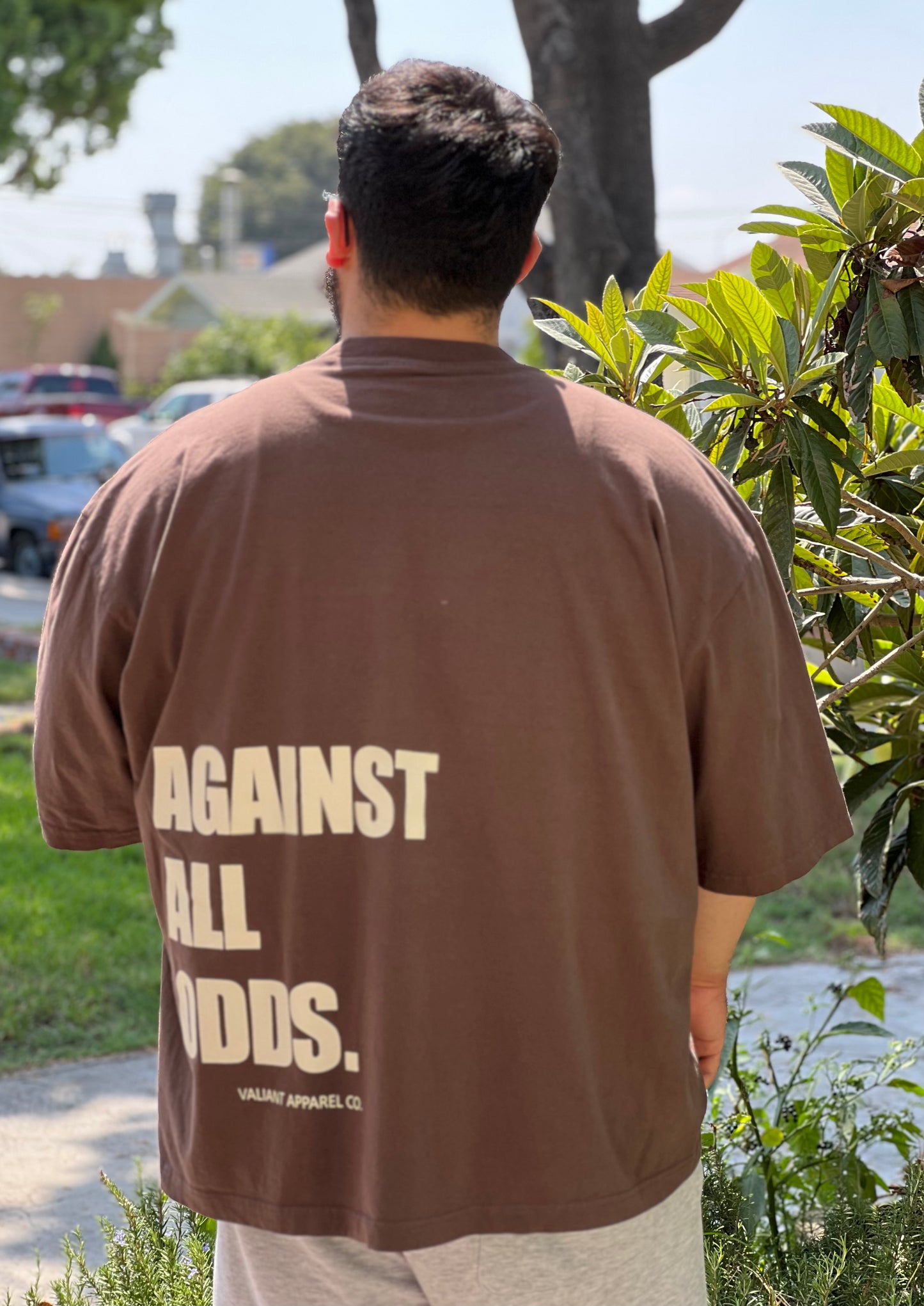 “AGAINST ALL ODDS” Drop Shoulder Tee