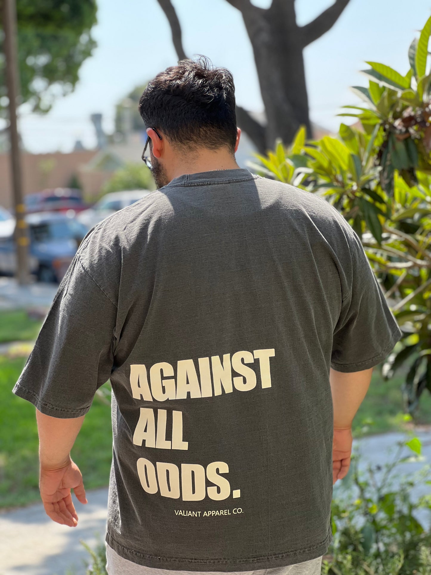 “AGAINST ALL ODDS” Drop Shoulder Tee