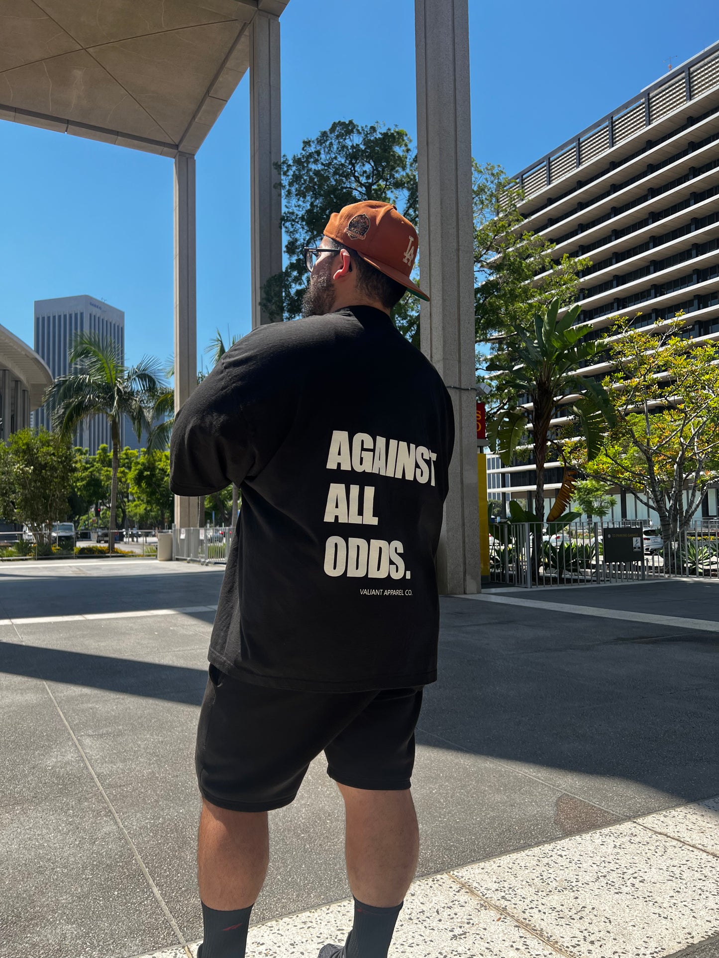 “AGAINST ALL ODDS” Drop Shoulder Tee